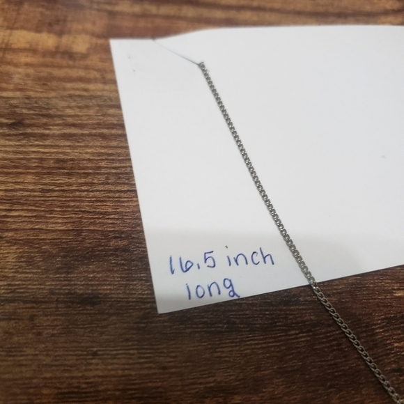 silver tone necklace with cream elephant pendant - Picture 4 of 5